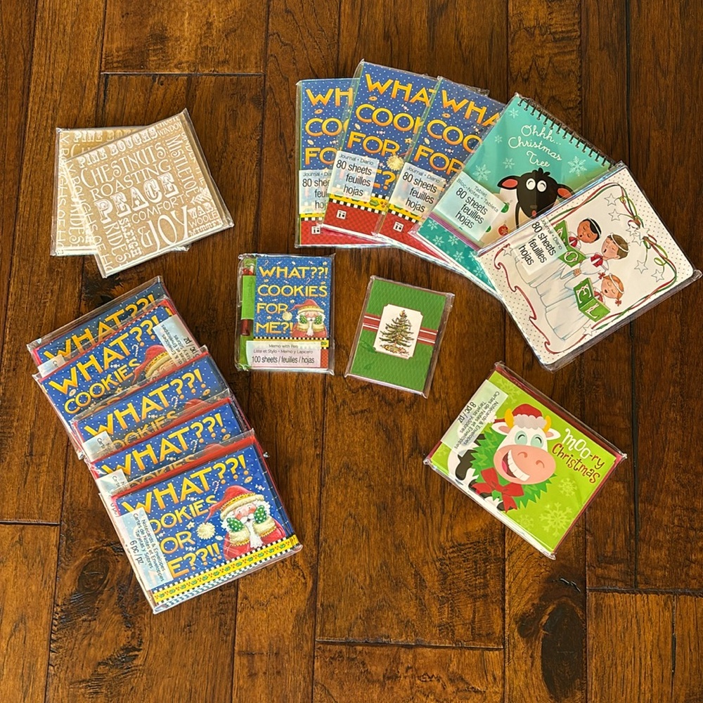 A great assortment of Christmas note cards and envelopes and notepads.  NWT